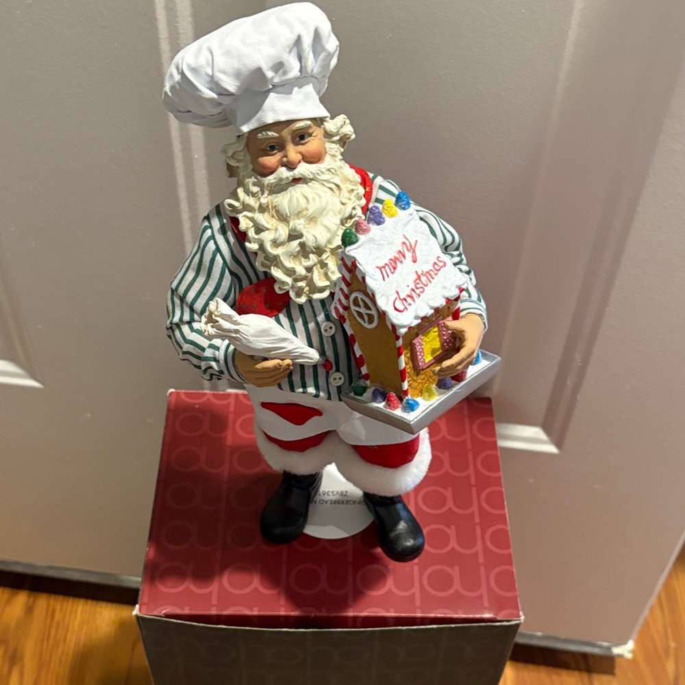 Santa Claus Chef Figurine with Gingerbread House